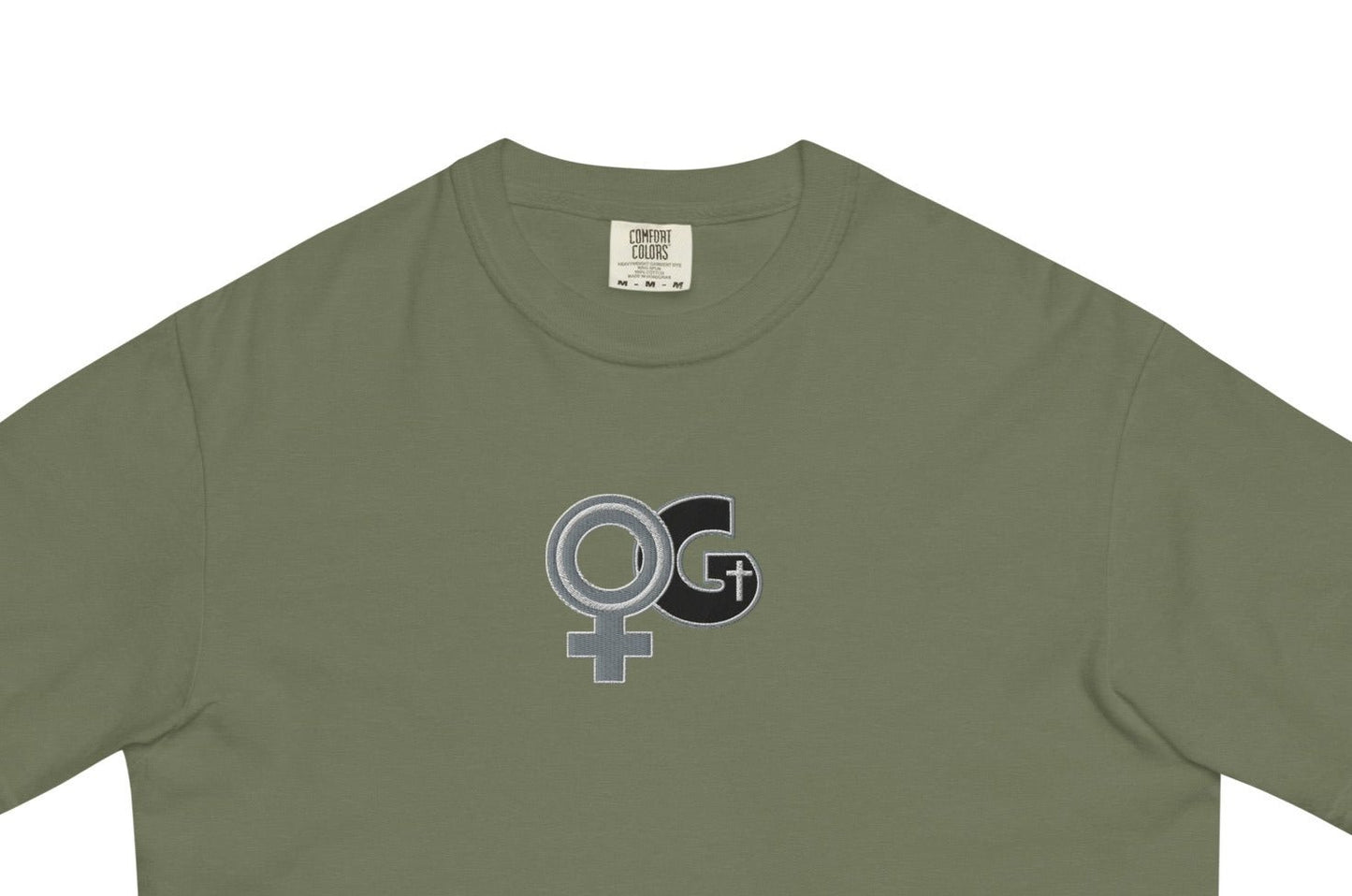 Front of moss t-shirt with embroidered black and grey Woman of God symbol