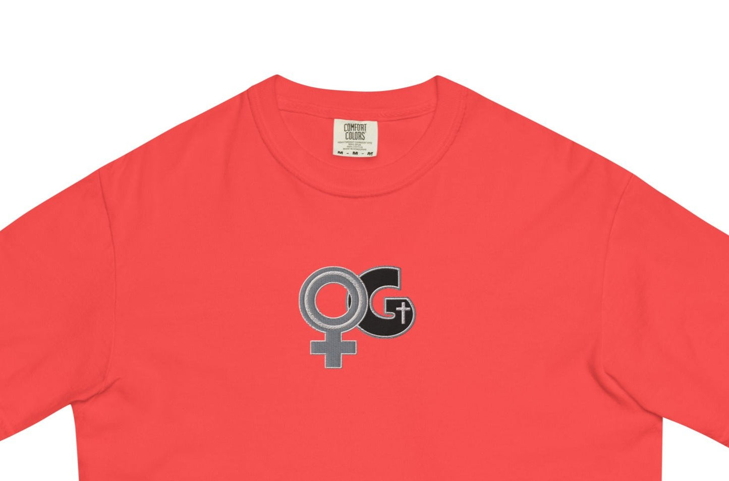 Front of paprika t-shirt with embroidered black and grey Woman of God symbol