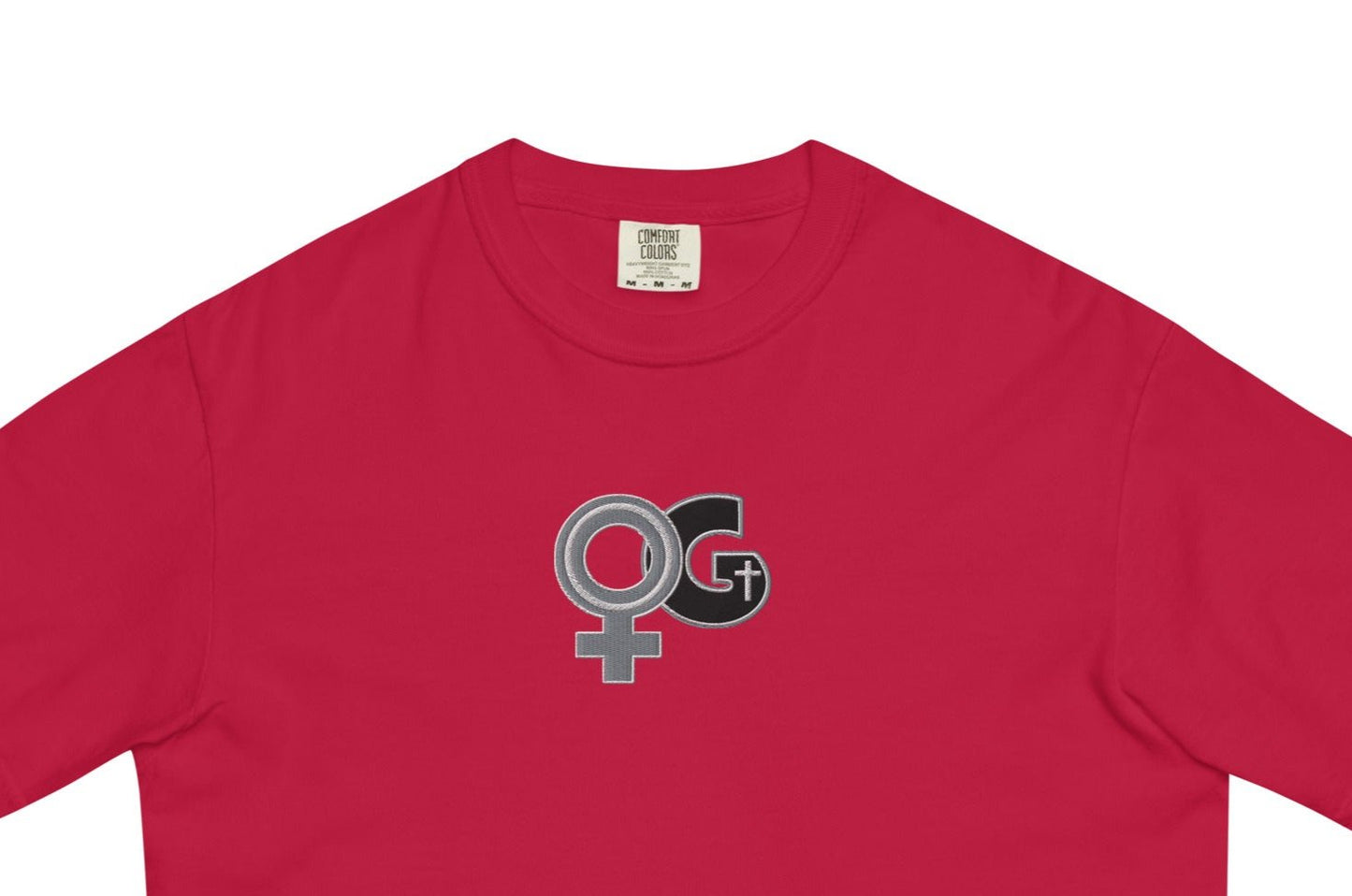 Front of red t-shirt with embroidered black and grey woman of God symbol