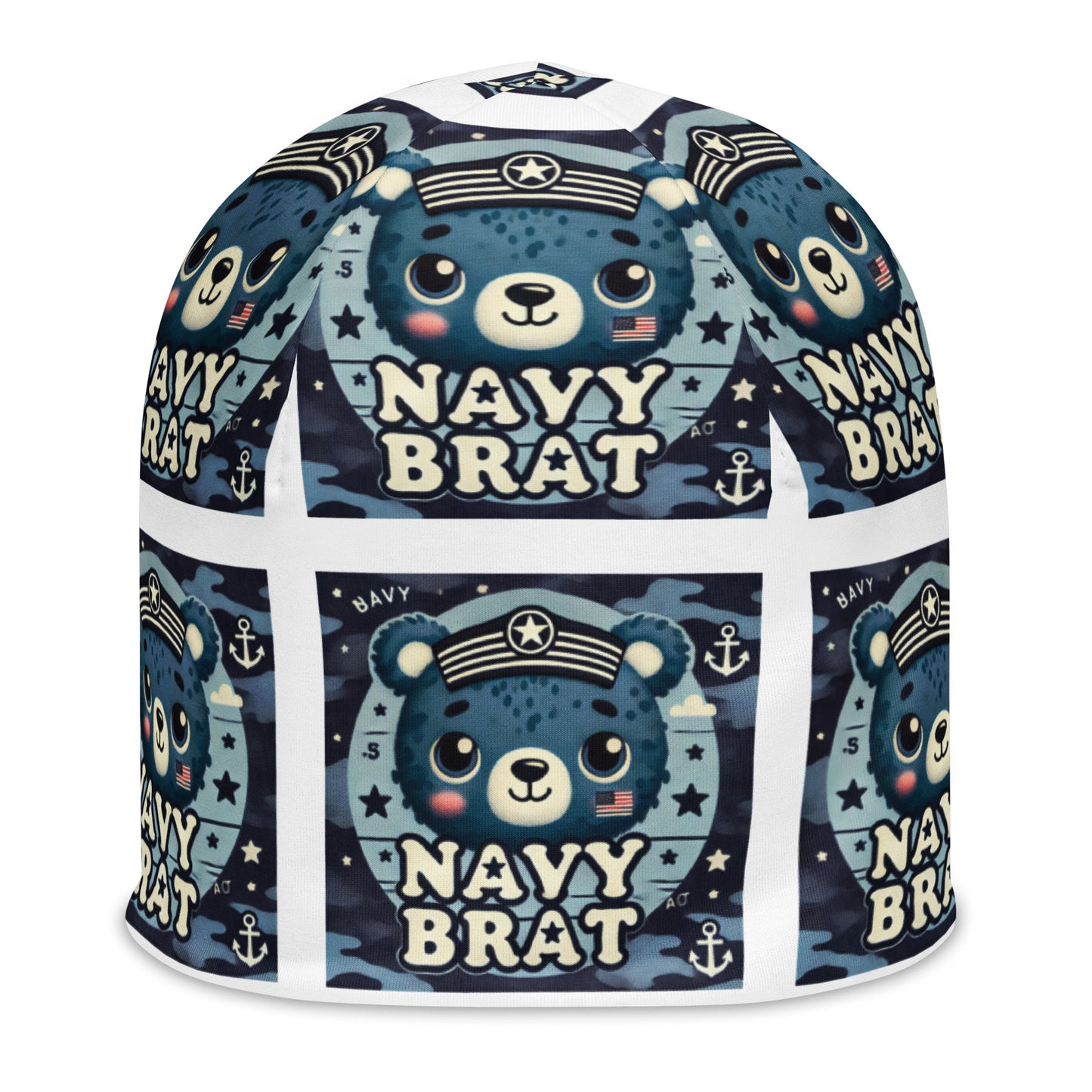 Front of youth beanie with blue baby bear and words saying 'navy brat' in blue pattern