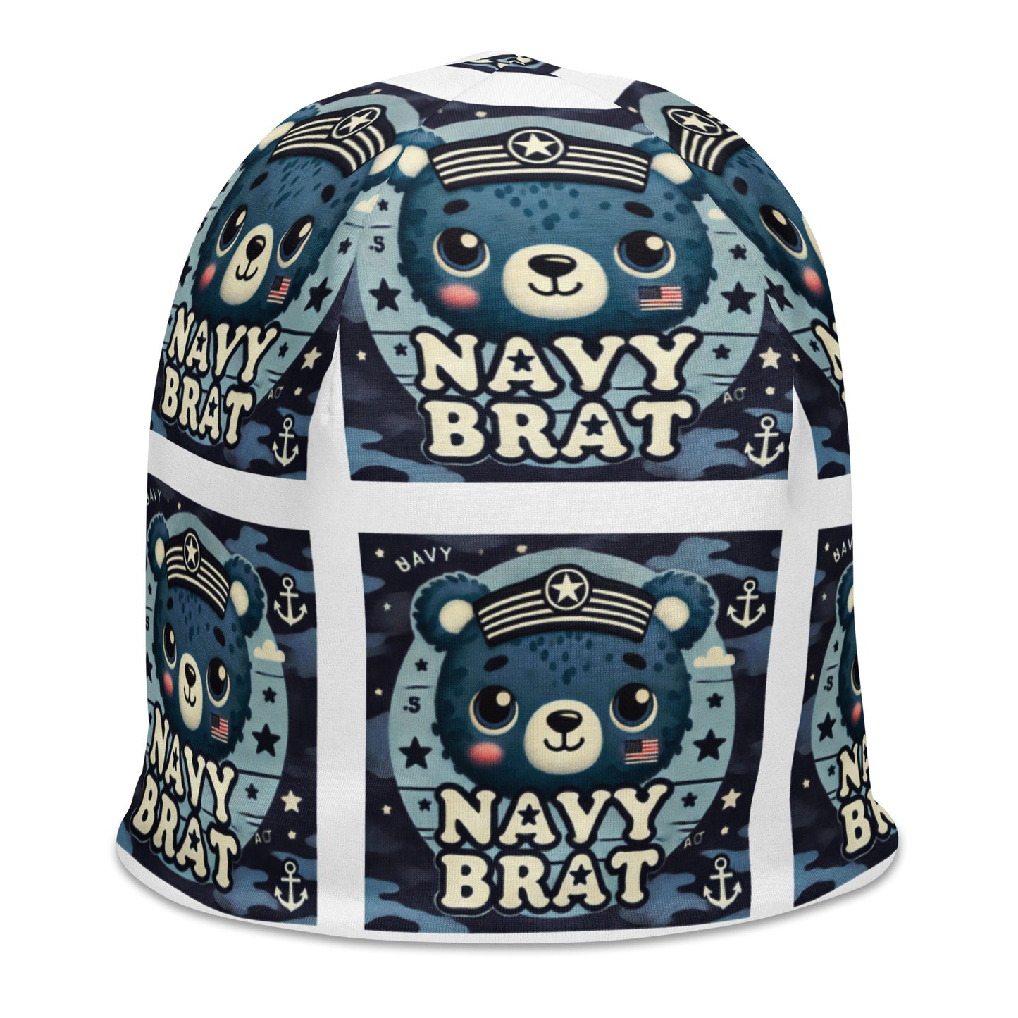 Right front of youth beanie with blue baby bear and words saying 'navy brat' in blue pattern