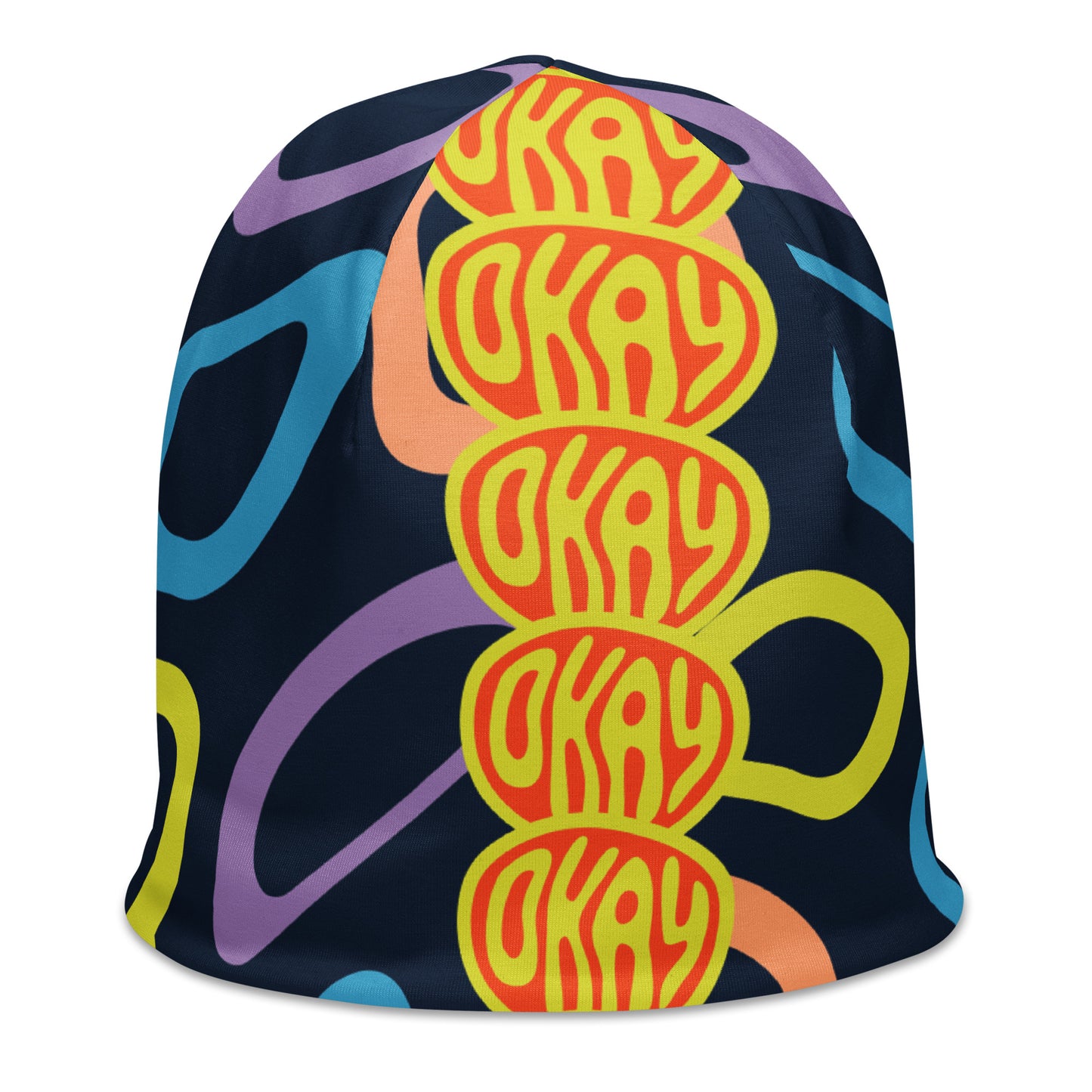 Right front of multi-colored and black print youth beanie with red and yellow icon saying 'okay'