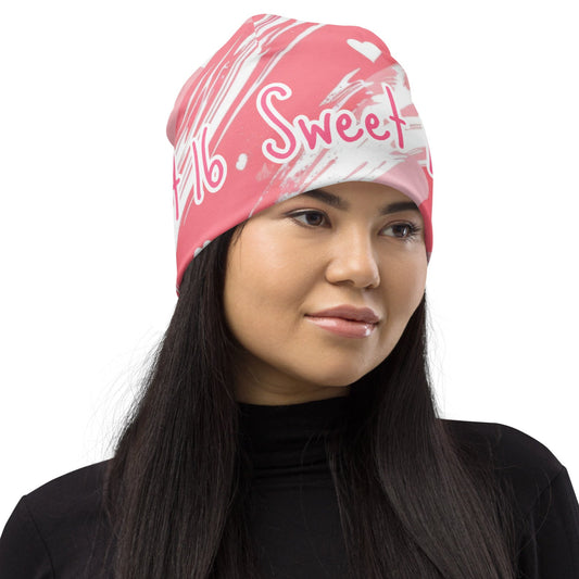 Front of Sweet 16 Youth Beanie with pink and white background and text saying 'Sweet 16'