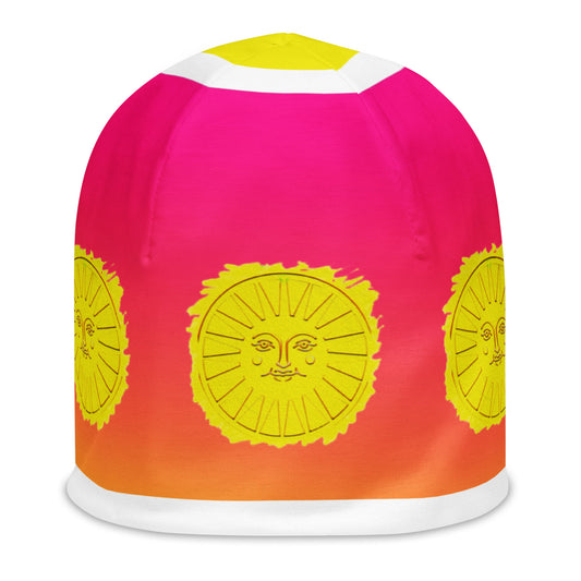 Front of pink and fuchsia gradient beanie with sunshine pattern