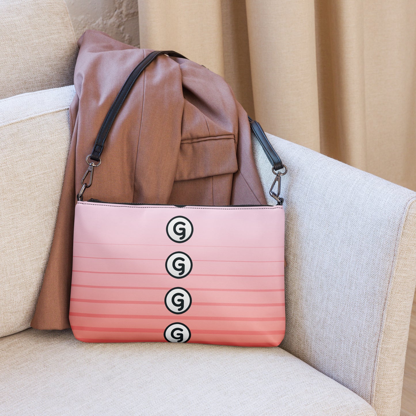 Back of crossbody bag with pink lined print