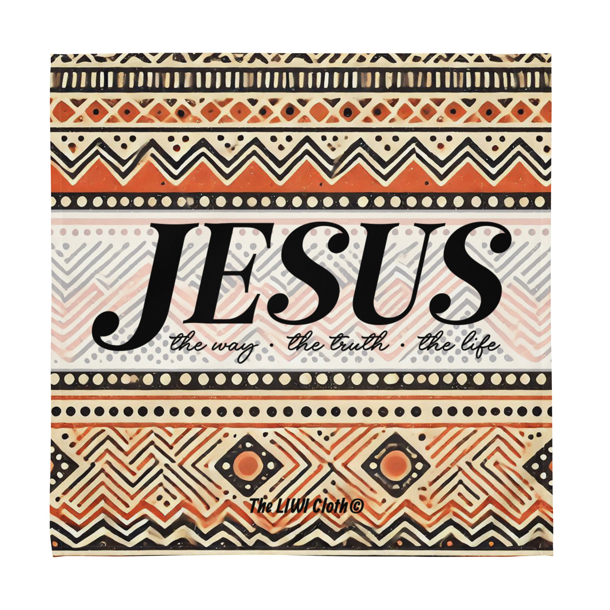 Front of LIWI cloth with orange, beige, black and white pattern text saying 'Jesus the way, the truth, the life'