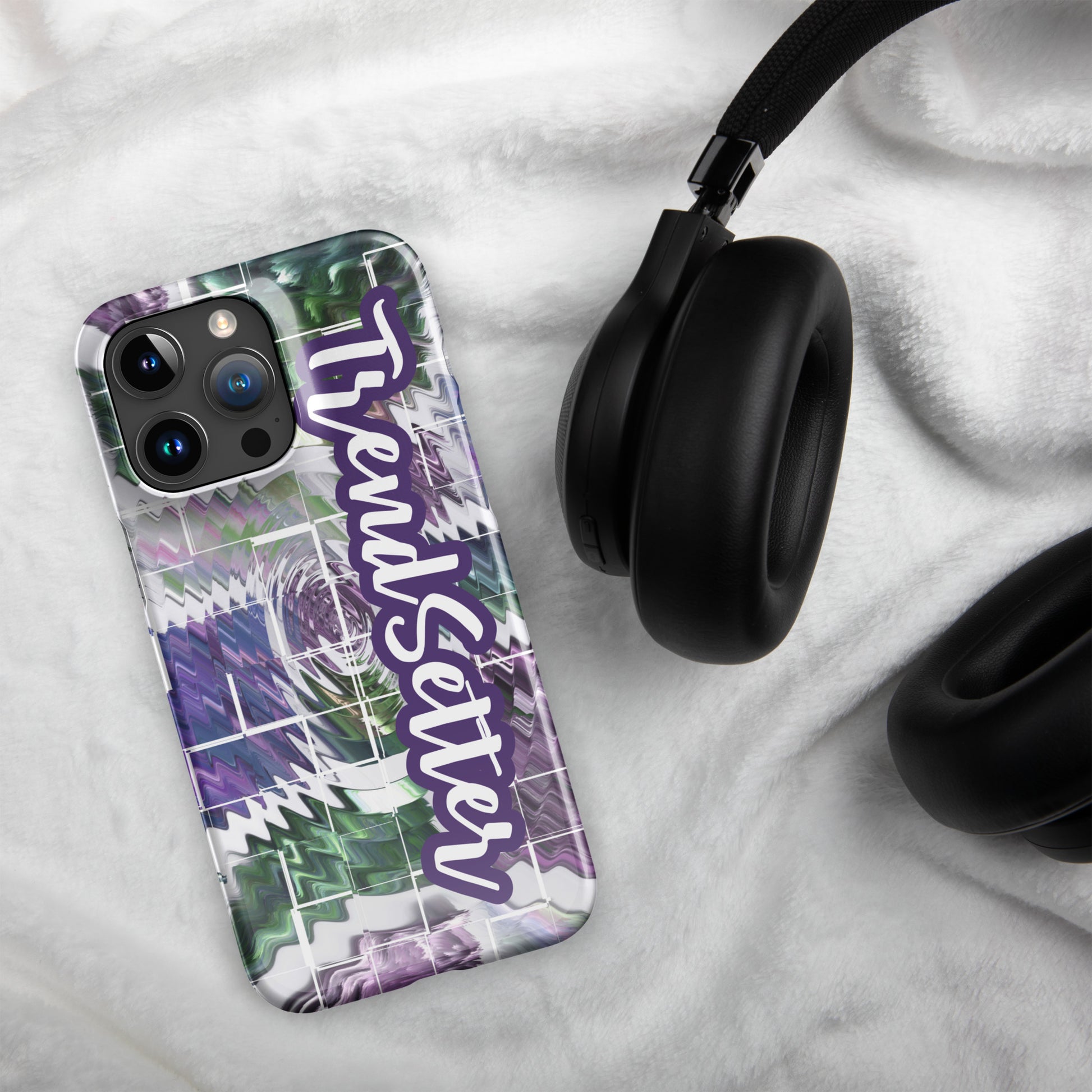 Front of Trendsetter snap case for iPhone with purple, green, and white abstract cover and text saying 'TrendSetter'